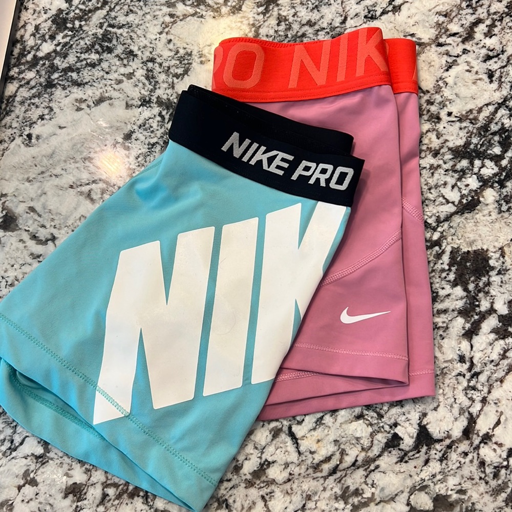 2 Nike Pros Pink and Blue Size medium